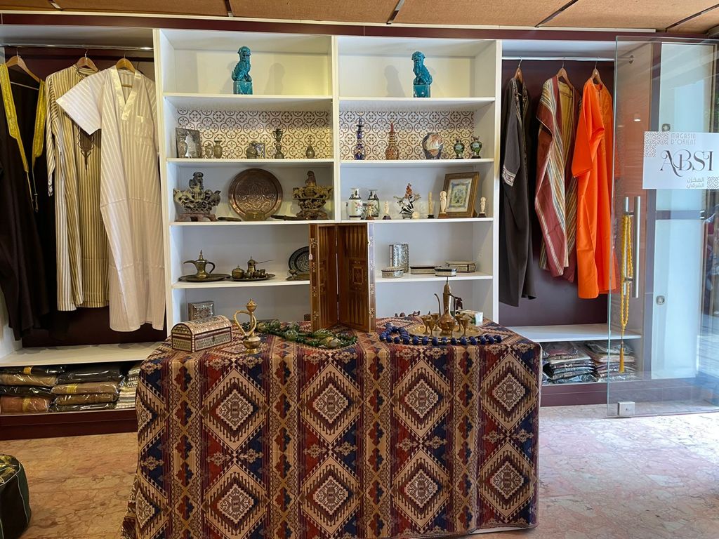 Clothing and souvenirs displayed at a supported oriental goods shop