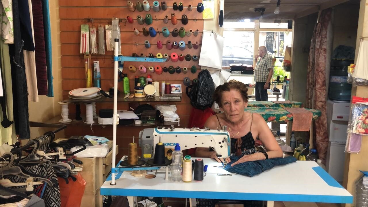 A seamstress at work in her supported workshop