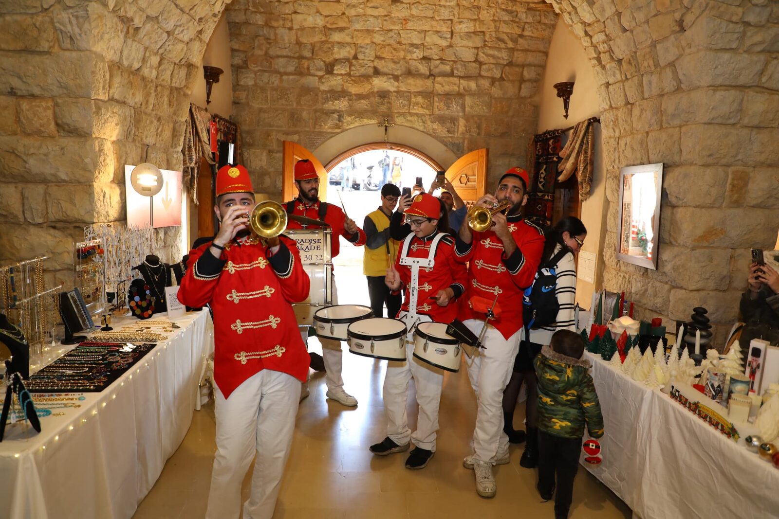 A marching band performing inside the heritage house